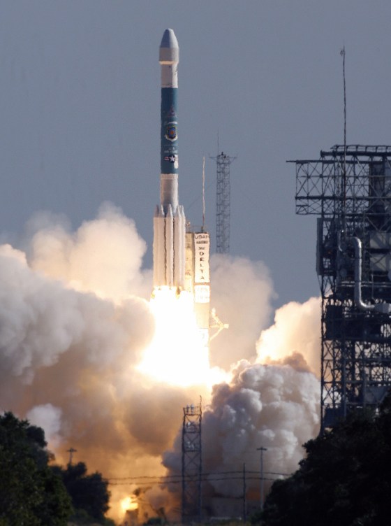 A Boeing Delta II rocket with a NAVSTAR Global Positioning System satellite aboard blasts off
