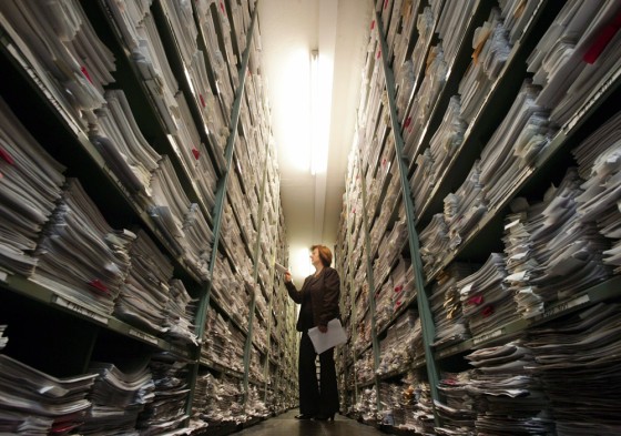 Spokeswoman Maria Raabe is seen in the correspondence archive at the International Tracing Service in Bad Arolsen, Germany, on Nov. 9. This vast archive — 16 miles of files in six nondescript buildings in the German spa town — contains the fullest records of Nazi persecutions in existence. 