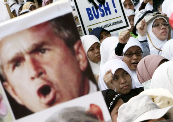 Women in Bogor, Indonesia, protest President Bush's visit on Monday.