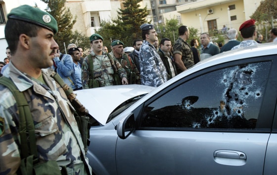 Lebanese security forces surround the bu