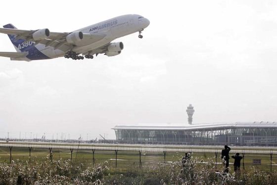An Airbus A380 takes off from Shanghai Pudong airport in Shanghai, China Friday as part of the process of winning its air-worthiness certification.