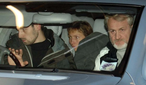 Marina, center, the wife of former Russian spy Alexander Litvinenko, leaves University College Hospital in London, accompanied by Chechen Foreign Minister Akhmed Zakayev following the announcement of her husband's death on Thursday night.