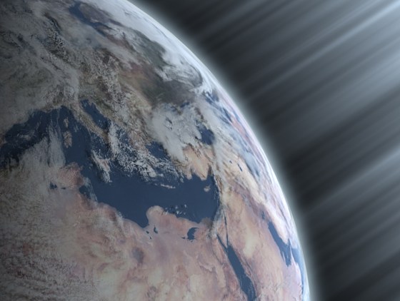 An artist's conception shows cosmic radiation entering Earth's atmosphere.