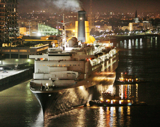 The Queen Elizabeth 2 sails on the Mississippi River as she prepares to dock at the Port of New Orleans Julia Street terminal on Monday.