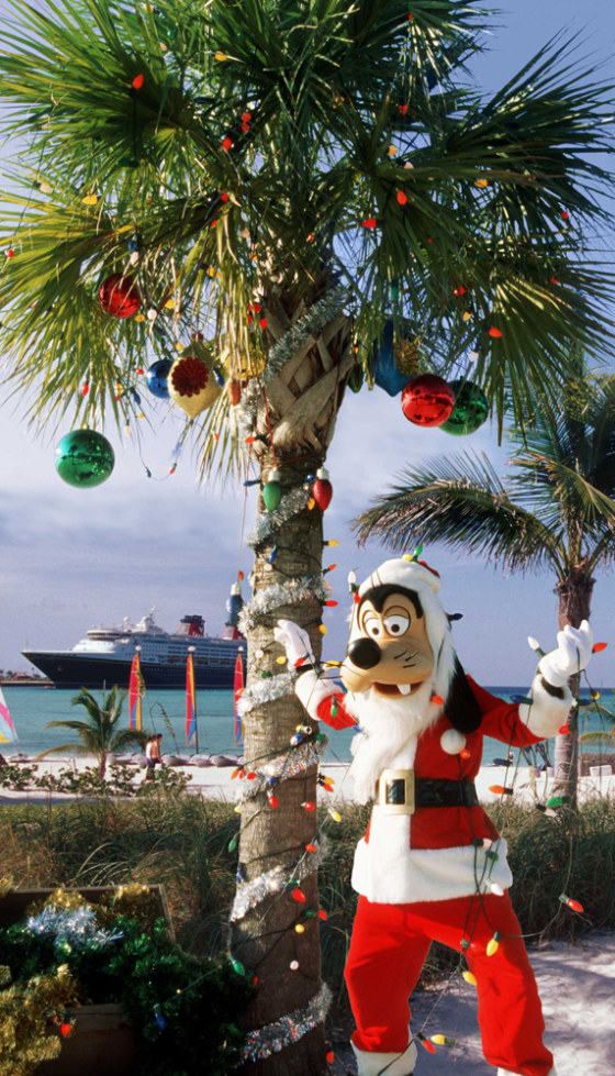 On Christmas, Santa (a.k.a. Goofy) visits with kids and doles out surprises on Disney Cruise Lines.