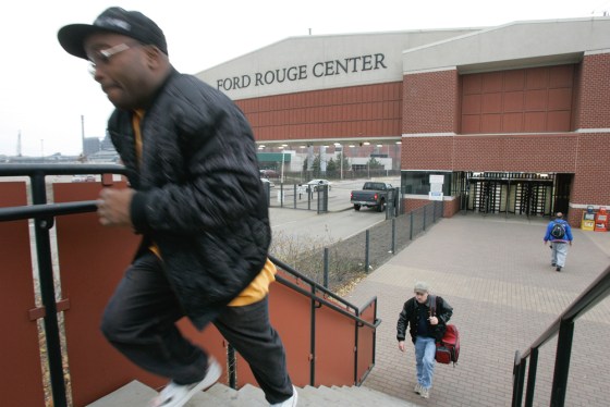 Employees change shifts at the Ford Dearborn Truck plant Wednesday. Nearly half of Ford's hourly workers have accepted buyout offers this year.