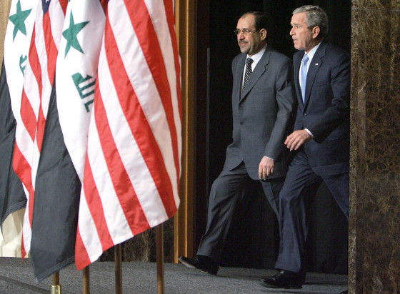US President George W. Bush (R) and Iraq
