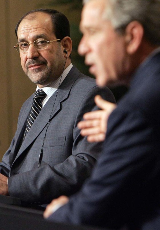 US President George W. Bush (R) speaks during a joing press conference with Iraqi Prime Minister Nouri Maliki at the Four Seasons Hotel in Amman, Jordan, 30 November 2006. Bush praised Iraq's embattled premier as the \"right guy\" for the job and said US forces would stay in Iraq \"to get the job done\". 