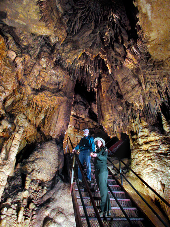 A park ranger, right, and unidentified man look at Frozen Niagara in Mammoth Cave in this undated photo in Mammoth Cave, Ky. National Park Service employees and Western Kentucky University researchers are working on finding out why water at Mammoth Cave has shown spikes in fecal coliform and E. coli bacteria. 