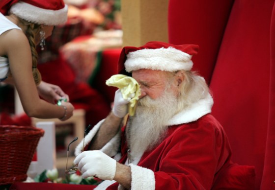 TIRED SANTA ON THE LAST BUSY WEEKEND BEFORE CHRISTMAS