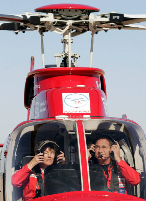 British helicopter pilots Murray and Bodill put on their headsets in preparation for departure from Fort Worth Alliance Airport