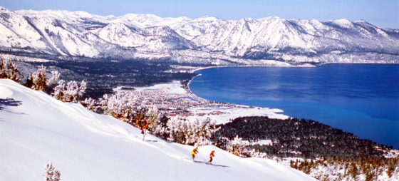 Skiers make their way down the slopes at Heavenly Ski Resort in South Lake Tahoe, Calif.