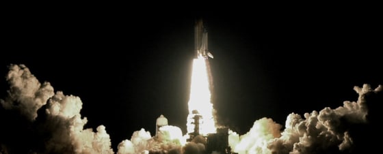 The space shuttle Endeavour lifts off from Kennedy Space Center in Cape Canaveral, Fla., beginning an 11-day mission to the international space station in this Nov. 23, 2002 file photo.