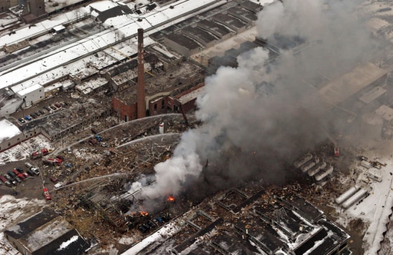 Milwaukee firefighters battle a five-alarm blaze after an explosion Wednesday at the Falk Corp. in Milwaukee. The blast killed three people and injured 46 more.
