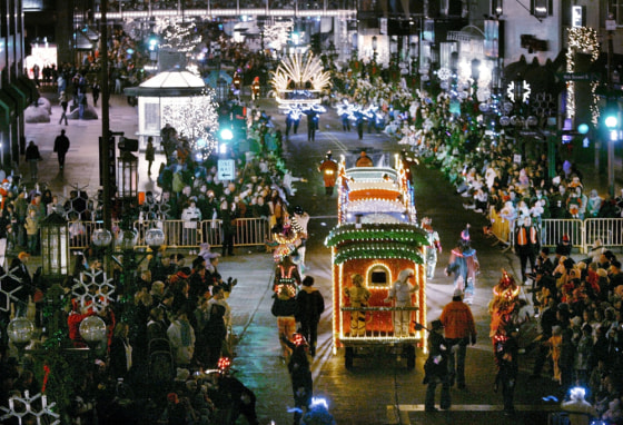 Thousands of people line the Nicollet Mall in downtown Minneapolis late last month during the Holidazzle Parade with its fairy-tale and Christmas themes.