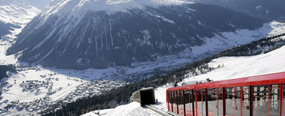 ** FILE ** The Parsenn cable railway enters a tunnel in the ski resort of Davos, Switzerland, Jan. 24, 2006. Mountain seen in background is the Jakobshorn. This snowboarding haven possesses three snowboarding schools, a couple of boardercross circuits, funparks, two monster pipes, a quarterpipe and even some night riding, all on exceptional terrain with deep powder, wooded runs and big natural hits. (AP Photo/Michel Euler)
