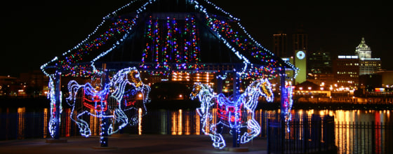 The carousel display in the new Folepis RiverFront Promenade is seen during the Festival of Lights in East Peoria, Ill. The carousel is animated by synchronized blinking lights, and is attached to a pavilion in the park. 