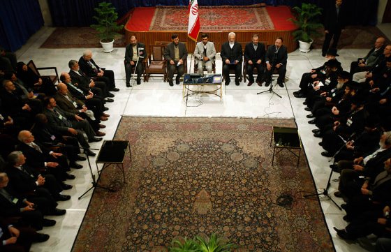 Iranian President Mahmoud Ahmadinejad attends a meeting with participants of Holocaust conference in Tehran