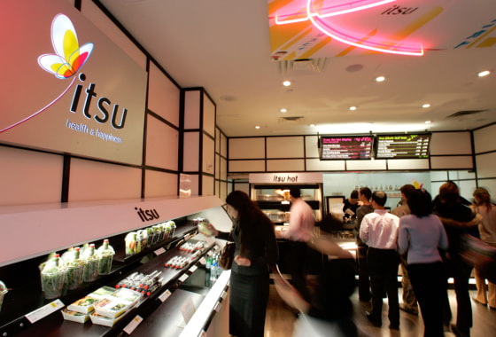 Patrons move around the Itsu restaurant in New York City on Tuesday. The new sushi restaurant didn't need to spend much for advertising and generating buzz before it opened this week. 