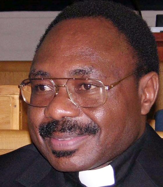 Seromba, former Rwandan Catholic priest, sits in the dock at the International Crinial Tribunal for Rwanda (ICTR) in Arusha