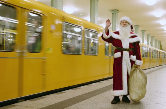 A man dressed as Father Christmas, or Sa