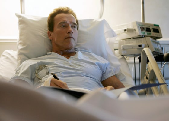 Gov. Arnold Schwarzenegger, R-Calif., lies in his hospital room in Santa Monica, Calif., on Thursday recovering from leg surgery that followed a skiing accident in Idaho.