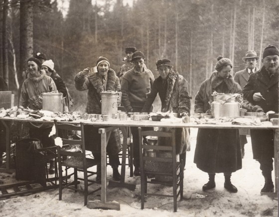 This 1932 photo provided by the Lake Placid Winter Olympic Museum shows a volunteer feed station for the Cross Country Ski events during the 1932 Winter Olympics in Lake Placid, N.Y.