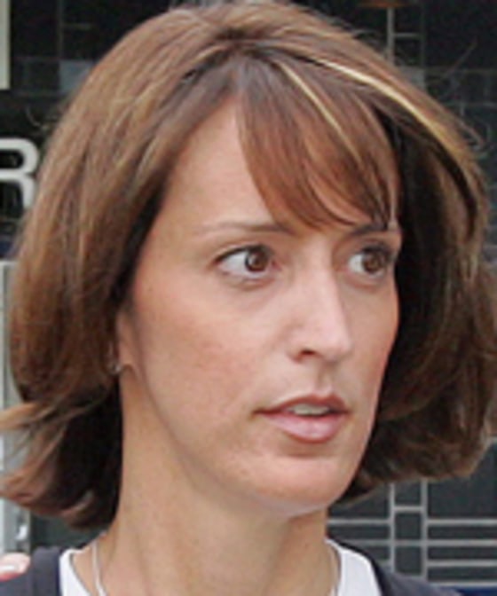 Jennifer Wilbanks, shown in a June 2, 2005 photo, has dropped her lawsuit against her former fiancé over a book deal.