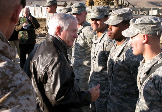 US Defense Secretary Robert Gates (C) vi