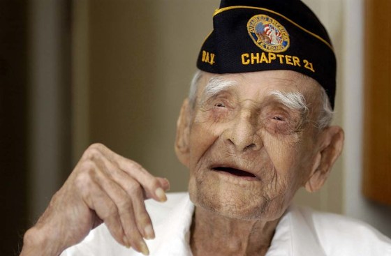 Emiliano Mercado Del Toro speaks to the media in Isabela, Puerto Rico, in this Jan. 20, 2005, file photo. Mercado, certified the oldest living person in the world by the Guinness Book of World Records, died of natural causes Wednesday at his home in Isabela. He was 115. 