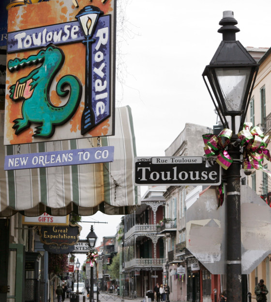 The street lamps are decorated with a purple green and gold bow in the French Quarter of New Orleans. Mardi Gras festivities start on Feb. 16 with the grand celebration on Feb. 20.