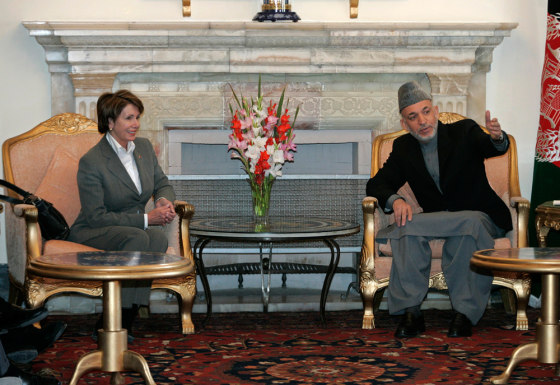 Afghan President Hamid Karzai speaks to U.S. House of Representatives speaker Nancy Pelosi during their meeting at the presidential palace in Kabul