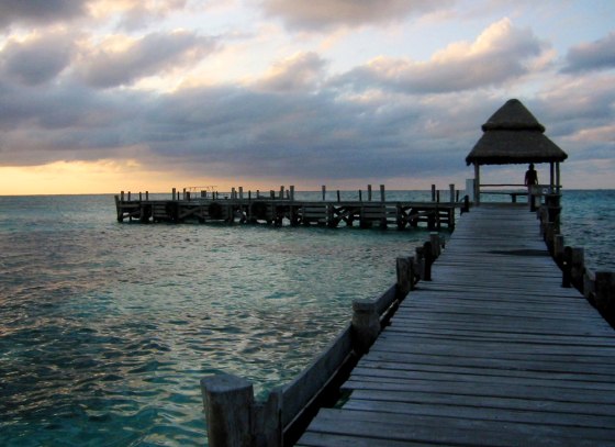 The sun sets near Playa Norte on Isla Mujeres, an island off the Yucatan Coast, Mexico.
