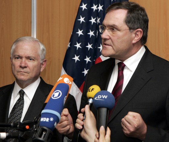 German Defense Minister Franz Josef Jung, right, and U.S. Defense Secretary Robert Gates address journalists at a NATO gathering Friday in Seville, Spain. Gates later traveled to Munich, Germany.