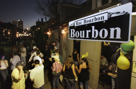 Revelers party on Bourbon Street in the French Quarter during Mardi Gras celebrations in New Orleans on Fat Tuesday, Feb. 28, 2006.