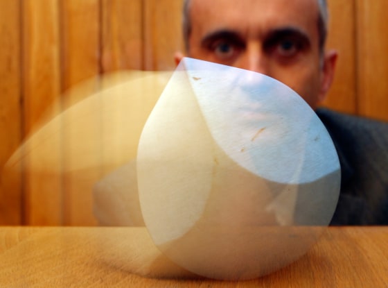 Gabor Domokos shows his invention \"Gomboc\" mono-monostatic body