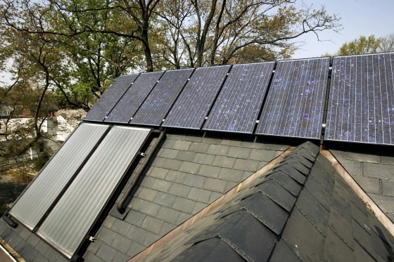 Solar panels are seen on the roof of an Arlington, Va. house. Taxpayers can claim up to a $500 tax credit on energy-saving home improvements.