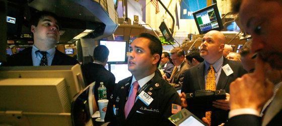 Traders work on the floor of the New York Stock Exchange
