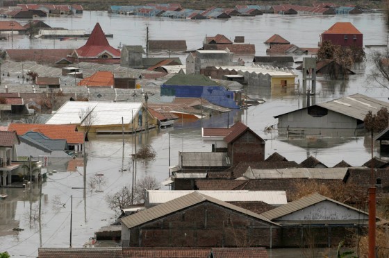 An aerial view shows houses flooded with mud in Sidoarjo in Indonesia's East Java province