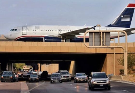 New buildings and ongoing construction interfere with control towers' ability to visually track aircraft at Phoenix Sky Harbor International.