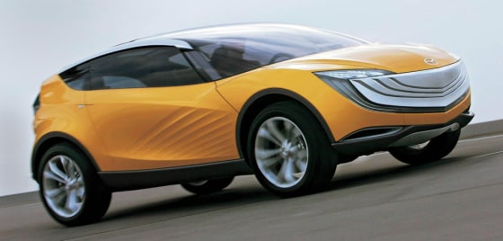The Mazda Hakaze concept has rippled surfaces along its fender line that were inspired by the windswept surface of a dune.