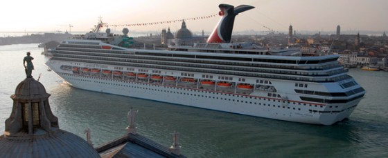The new Carnival Freedom sails by San Giorgio Maggiore church in Venice, Italy