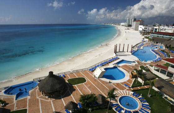 A view of the beach in Cancun, Mexico. Cancun's new beach, built by pumping 96 million cubic feet (27 million cubic meters) of sand from the ocean floor, is the highlight of an extreme makeover the resort has gone through since it was savaged by Hurricane Wilma on Oct. 21, 2005.