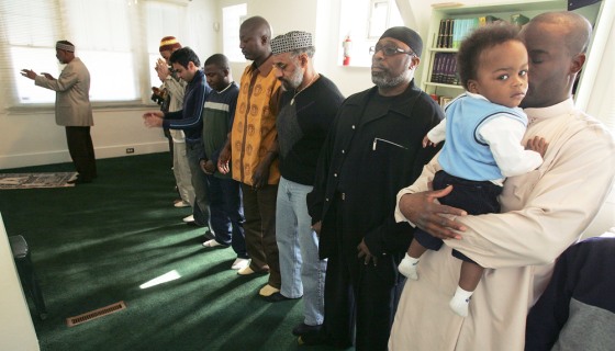 Muslim men gather at Masjid al-Mumin mosque for Friday prayers in Pittsburgh on March 9. Following what seems to be a trend in cities nationwide, religious leaders in that city and others have indicated an increase in black conversions to Sunni Islam since Sept. 11.