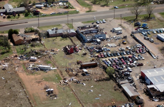 An aerial view of Clovis, N.M., shows damage caused by tornadoes that flattened houses, snapped telephone poles and heaved a trailer through a bowling alley.