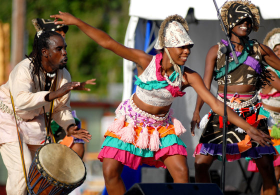 Islanders perform Sunday during a cultural show to mark the beginning of a year-long commemoration of the abolition of the trans-Atlantic slave trade in the British Empire.