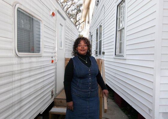 Joyce Ridgeway living in a FEMA trailer next to her New Orleans home. She is still waiting for her final settlements from Lloyd’s.