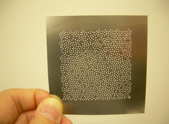 Almost all the radiation passed through the metal foils with these Penrose quasicrystal patterns. 