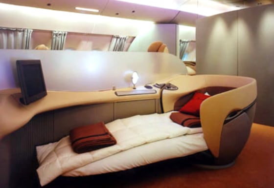 Future first-class seats will be more like mini-suites with sliding doors for total privacy to sleep, dine or hold business meetings.