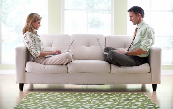 Couple Working Together at Home